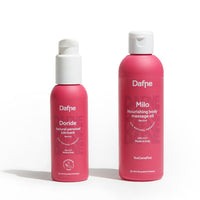 Essential kit Dafne con olio massaggio Milo e lubrificante Doride su sfondo bianco
