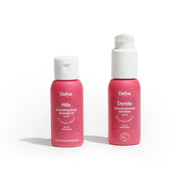 Travel Kit Dafne con olio da massaggio Milo e lubrificante Doride in formato 50ml, su sfondo bianco