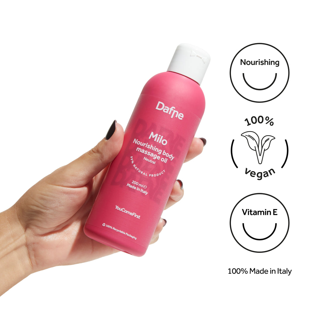 Olio da massaggio Milo Dafne , flacone impugnato da una mano, con icone su vitamina E, formula vegana e Made in Italy